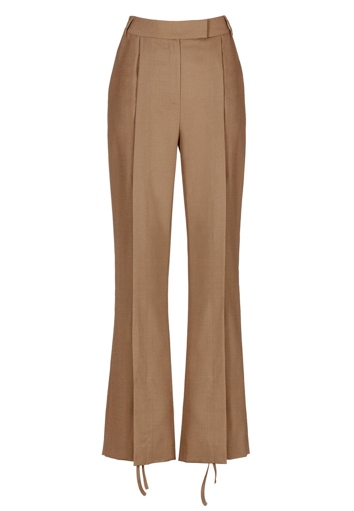 Wide-leg braided pants in camel. Features pockets, belt loops, and deep openings connected by strings. Fits oversize.