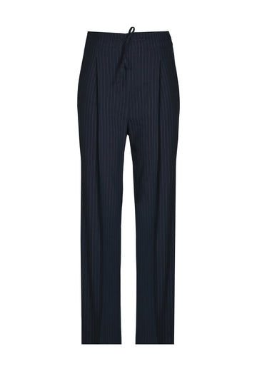 Easy-wear trousers featuring regular cut and drawstring fastening. Detailed with side slit and rear welt pockets. Cut from a light wrinkled viscose with washed look that emphasizes the relaxed attitude. As a nod to the tuxedo pants, it has a self-fabric side seam stripe.