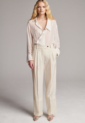 Long wide-leg trousers cut from a linen blend. Detailed with insideout details, welt pockets and button closure.