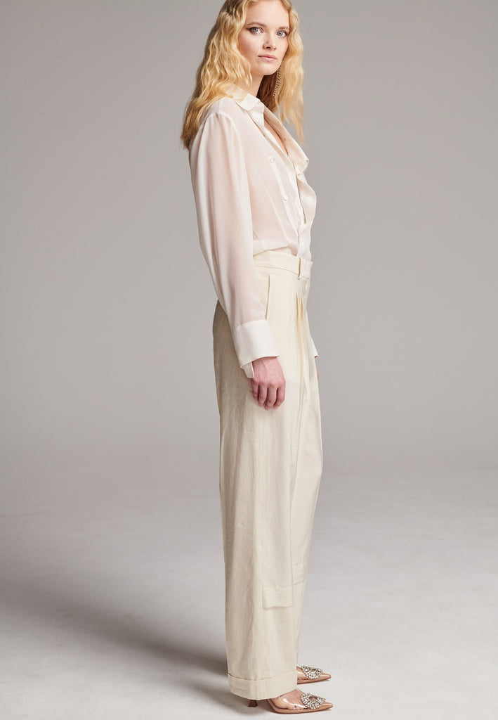 Long wide-leg trousers cut from a linen blend. Detailed with insideout details, welt pockets and button closure.