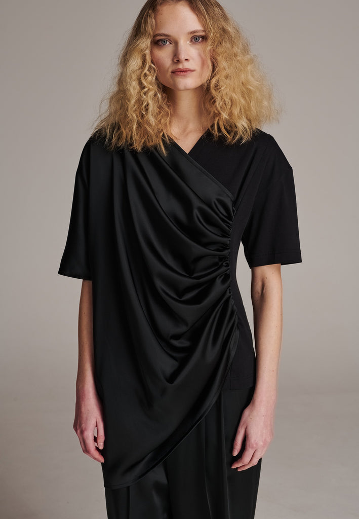 A unique addition to your closet. Cut for a relaxed fit. Detailed with a double layer with a ruffle effect, creating a unique piece. Designed for an oversized fit.&nbsp;
