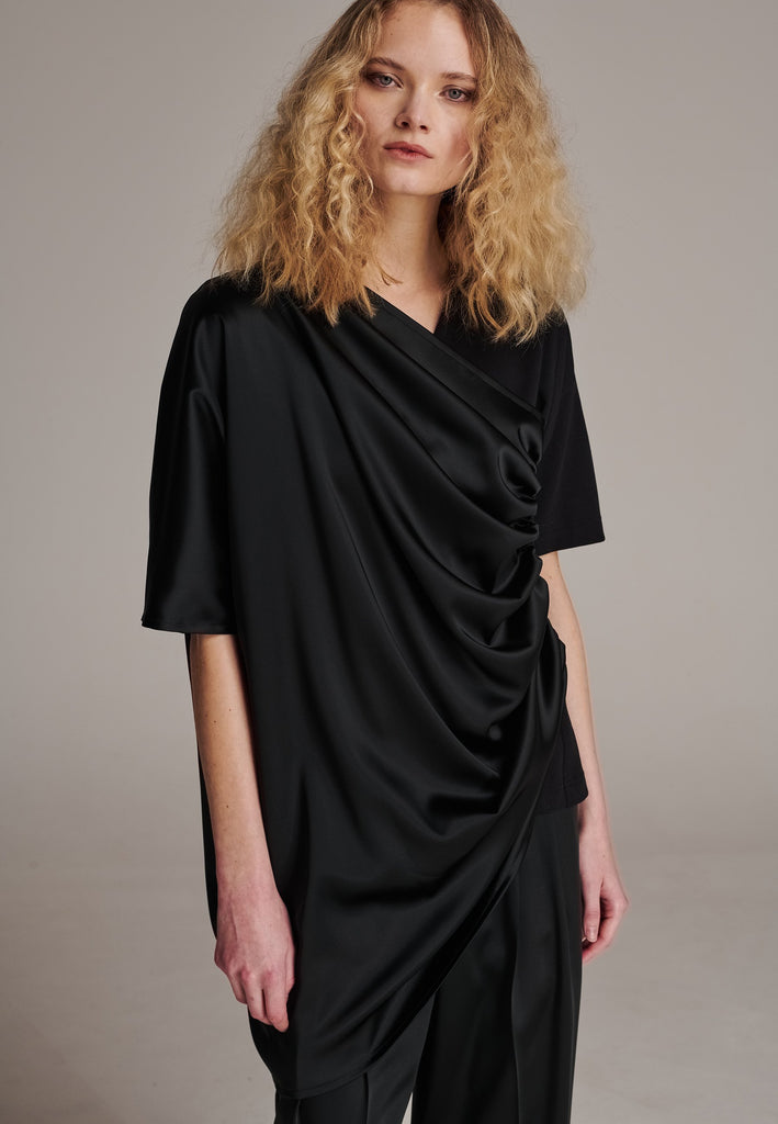A unique addition to your closet. Cut for a relaxed fit. Detailed with a double layer with a ruffle effect, creating a unique piece. Designed for an oversized fit.&nbsp;