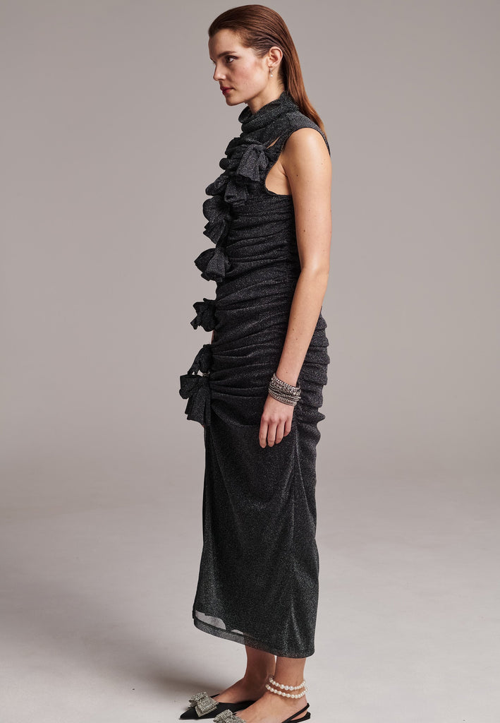 Embrace sophistication with this body-hugging jersey maxi dress. Artfully knotted all-over. Features a body-skimming silhouette.