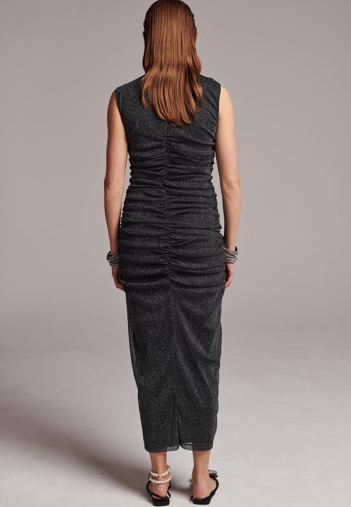 Embrace sophistication with this body-hugging jersey maxi dress. Artfully knotted all-over. Features a body-skimming silhouette.