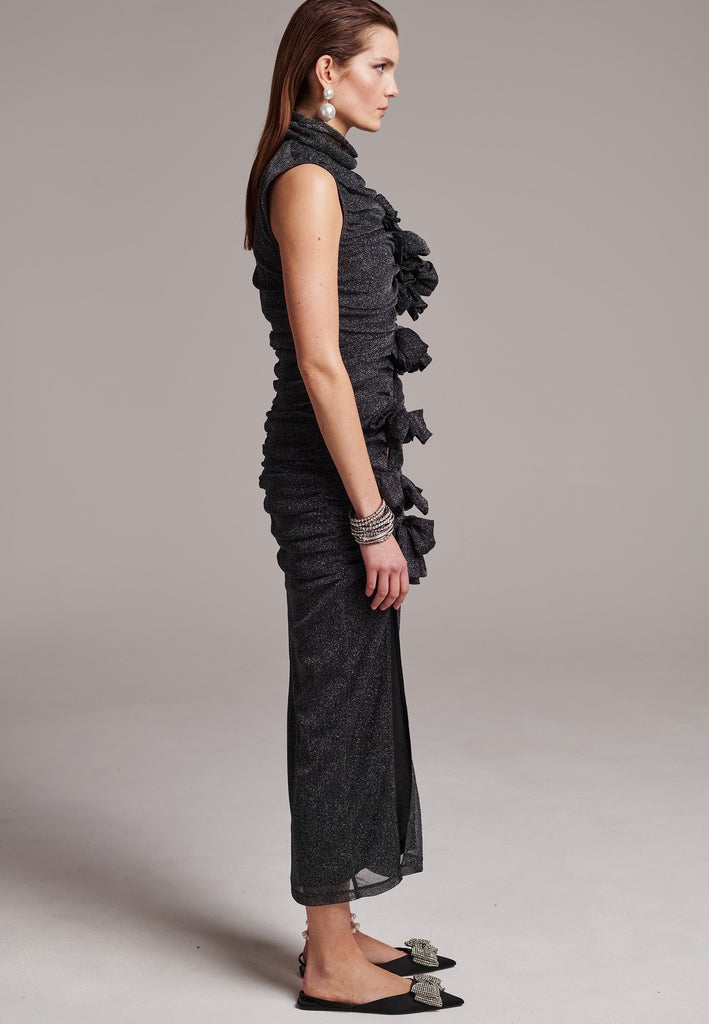 Embrace sophistication with this body-hugging jersey maxi dress. Artfully knotted all-over. Features a body-skimming silhouette.