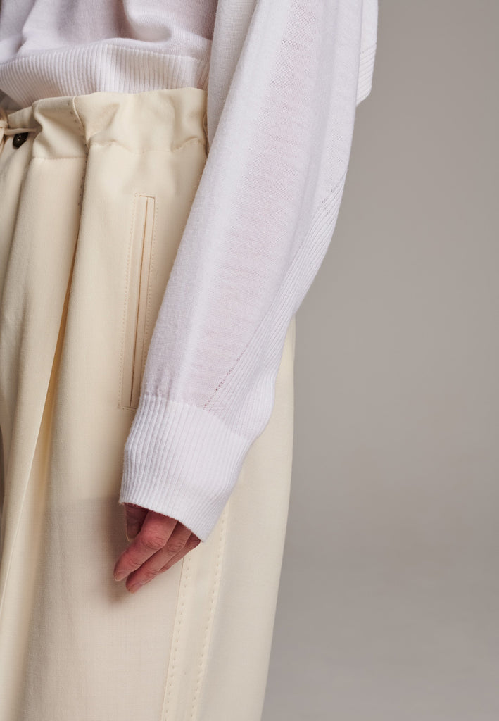 Sweater, crafted from luxurious virgin merino wool that gives a soft handle. Detailed with dropped shoulders, ribbed effect and batwing sleeves. Designed for a loose fit. Long in sleeves. This piece ensures you’ll stay snug and chic, even on the coldest days.