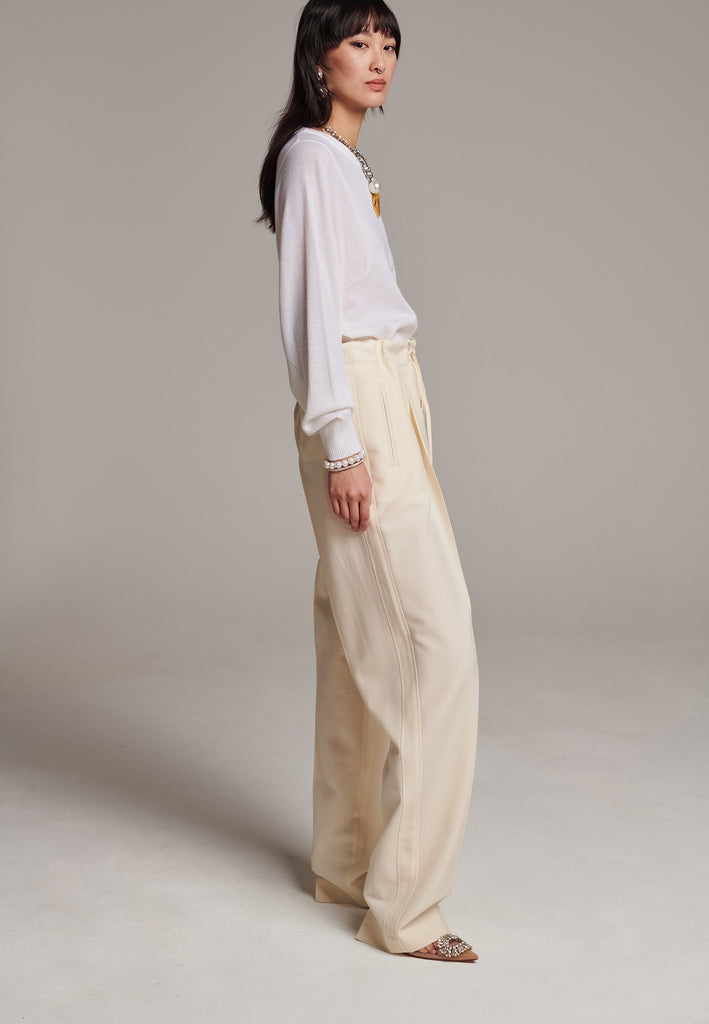 Sweater, crafted from luxurious virgin merino wool that gives a soft handle. Detailed with dropped shoulders, ribbed effect and batwing sleeves. Designed for a loose fit. Long in sleeves. This piece ensures you’ll stay snug and chic, even on the coldest days.