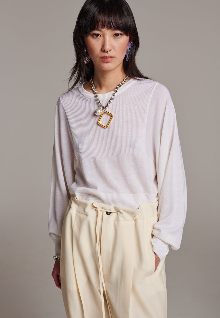 Sweater, crafted from luxurious virgin merino wool that gives a soft handle. Detailed with dropped shoulders, ribbed effect and batwing sleeves. Designed for a loose fit. Long in sleeves. This piece ensures you’ll stay snug and chic, even on the coldest days.