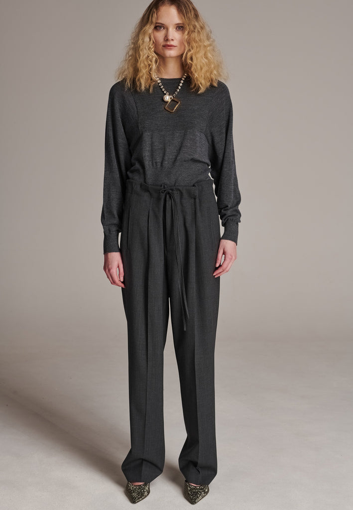 Refine your wardrobe with these straight-leg trousers, cut from a soft virgin wool. Featuring a sophisticated horn button and zip with a drawstring fastening at the waist. With a nod to the tuxedo pants, it has a fabric self-stripe with a needle point at the side seam. Complete with slanted pockets and welt back pockets, these trousers blend traditional elegance with modern functionality.