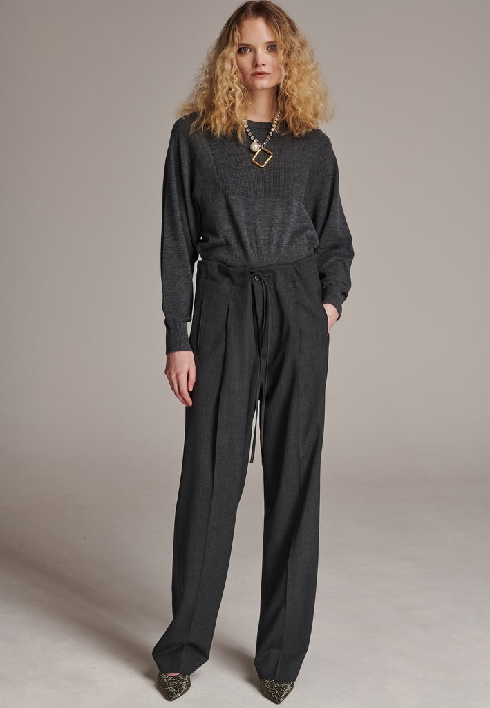Refine your wardrobe with these straight-leg trousers, cut from a soft virgin wool. Featuring a sophisticated horn button and zip with a drawstring fastening at the waist. With a nod to the tuxedo pants, it has a fabric self-stripe with a needle point at the side seam. Complete with slanted pockets and welt back pockets, these trousers blend traditional elegance with modern functionality.