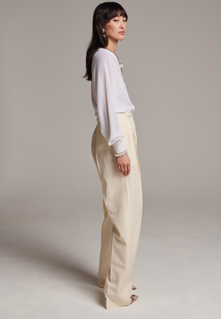Refine your wardrobe with these straight-leg trousers, cut from a soft virgin wool. Featuring a sophisticated horn button and zip with a drawstring fastening at the waist. With a nod to the tuxedo pants, it has a fabric self-stripe with a needle point at the side seam. Complete with slanted pockets and welt back pockets, these trousers blend traditional elegance with modern functionality.