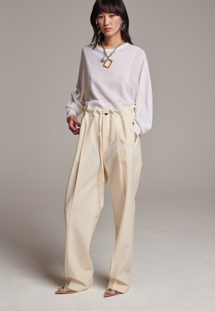 Refine your wardrobe with these straight-leg trousers, cut from a soft virgin wool. Featuring a sophisticated horn button and zip with a drawstring fastening at the waist. With a nod to the tuxedo pants, it has a fabric self-stripe with a needle point at the side seam. Complete with slanted pockets and welt back pockets, these trousers blend traditional elegance with modern functionality.