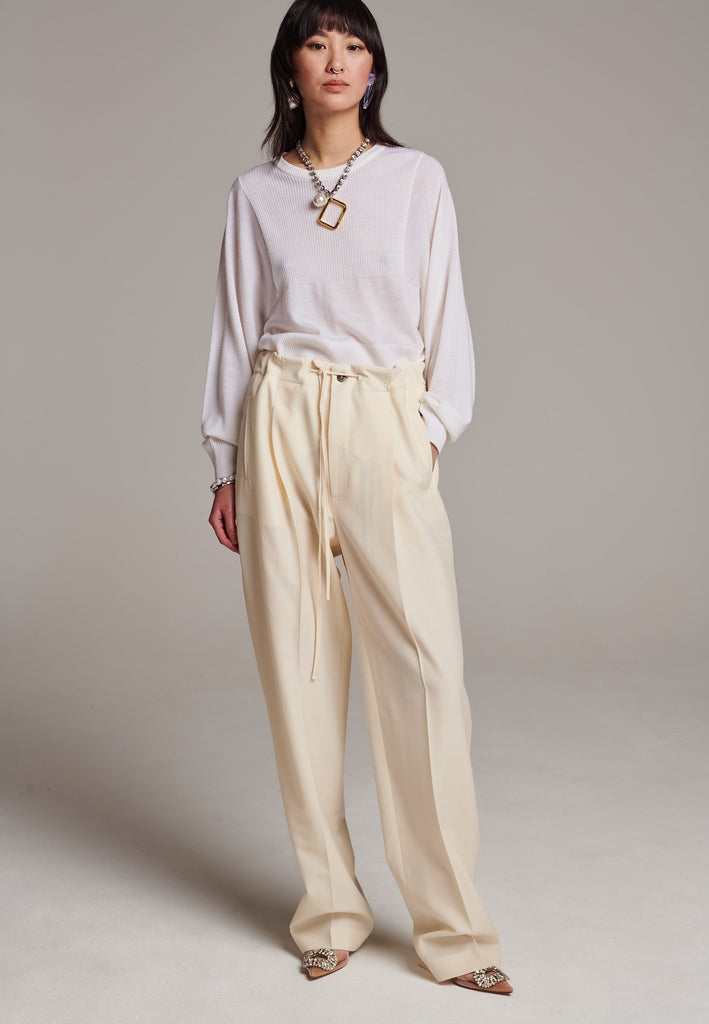 Refine your wardrobe with these straight-leg trousers, cut from a soft virgin wool. Featuring a sophisticated horn button and zip with a drawstring fastening at the waist. With a nod to the tuxedo pants, it has a fabric self-stripe with a needle point at the side seam. Complete with slanted pockets and welt back pockets, these trousers blend traditional elegance with modern functionality.