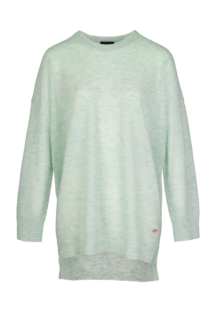 Light green knit. Oversized light knitted sweater in a perfect color melange pistachio pastel.