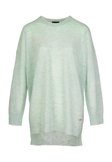 Light green knit. Oversized light knitted sweater in a perfect color melange pistachio pastel.