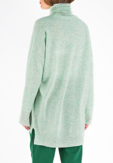 Knit | Light Green. Oversized light knitted sweater. This wool mix has a very soft handfeel. Oneven side seam.