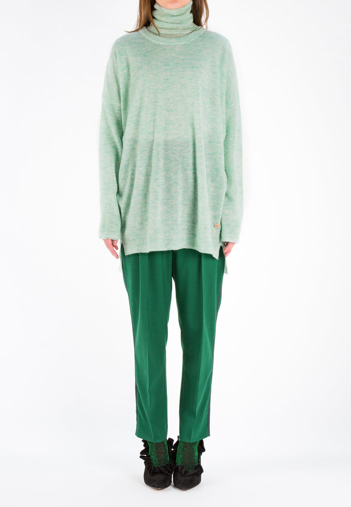 Knit | Light Green. Oversized light knitted sweater. This wool mix has a very soft handfeel. Oneven side seam.
