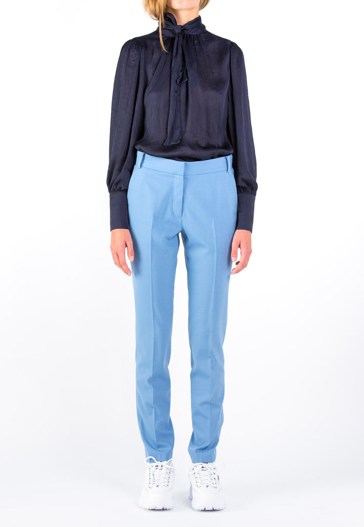 Lean pants, ice color. Light wool cigarette pants with belt loops, zipper closure. Back welt pocket. frenkenfashion.com