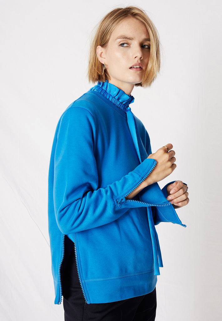Fun | Top | Azure. A cool easy wearing relaxed fit sweater detailed with a bolt zip in the waist and at both cuffs. Amsterdam fashion