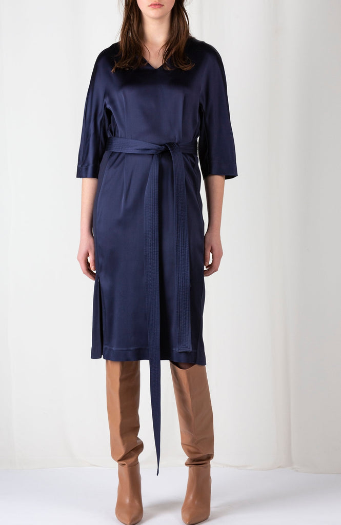 Faded | Dress | Dark Navy. Satin cool easy wearing relaxed fitted midi dress. With a long double stitched belt. Two zips between the side panel.