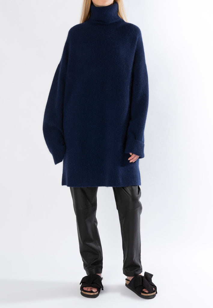 Ring knitted dress navy. Amsterdam fashion. Mega oversized turtleneck jumper dress finely knitted from fluffy care-gora.