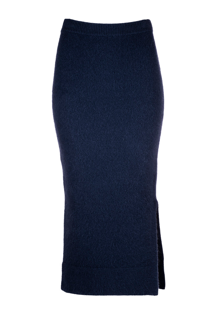 Navy tick skirt. 54% Merino wool, 18% Angora, 18% Nylon, 10% Elastane. Midi skirt finely knitted from soft fluffy care-gora in a figure-hugging silhouette and has a ribbed, elasticated waistband that sits at your narrowest point.