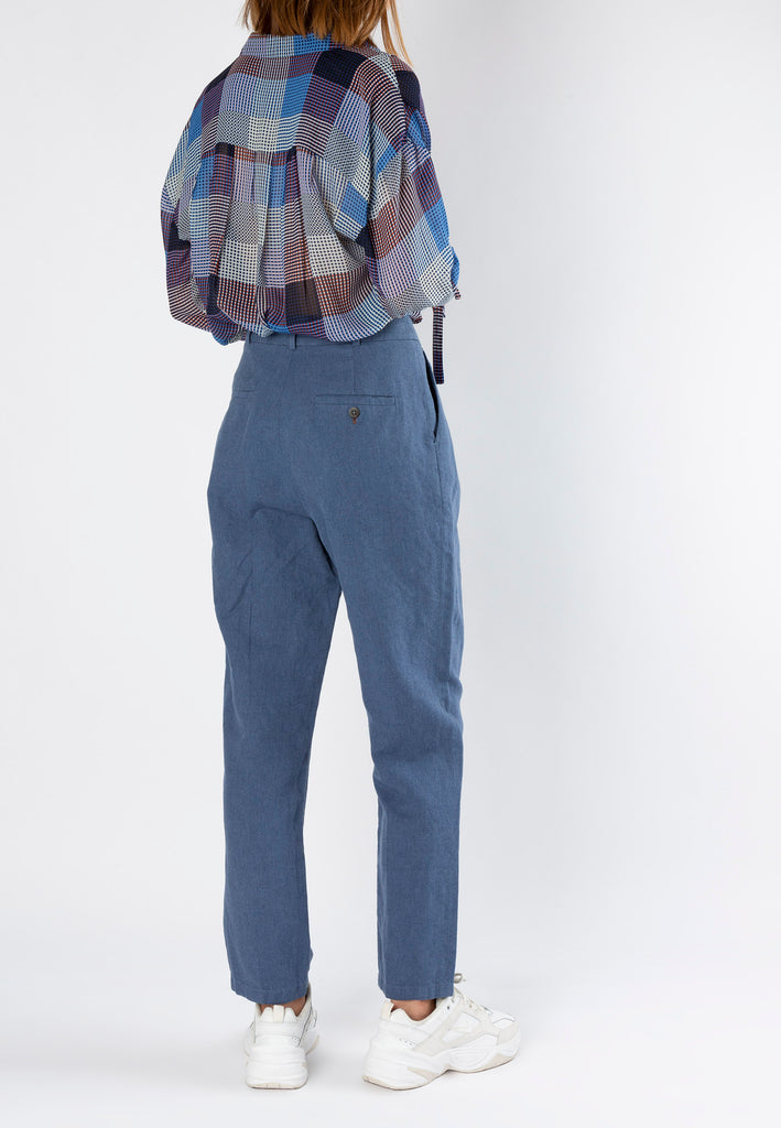 Tread | Pants | Indigo. Impeccable fitting pant made from a cotton-linen blend in indigo bright color. This is a tailored cropped pant with a narrow leg fitting, detailed with front pleats at the waistline. Expertly made in Portugal. Women clothes