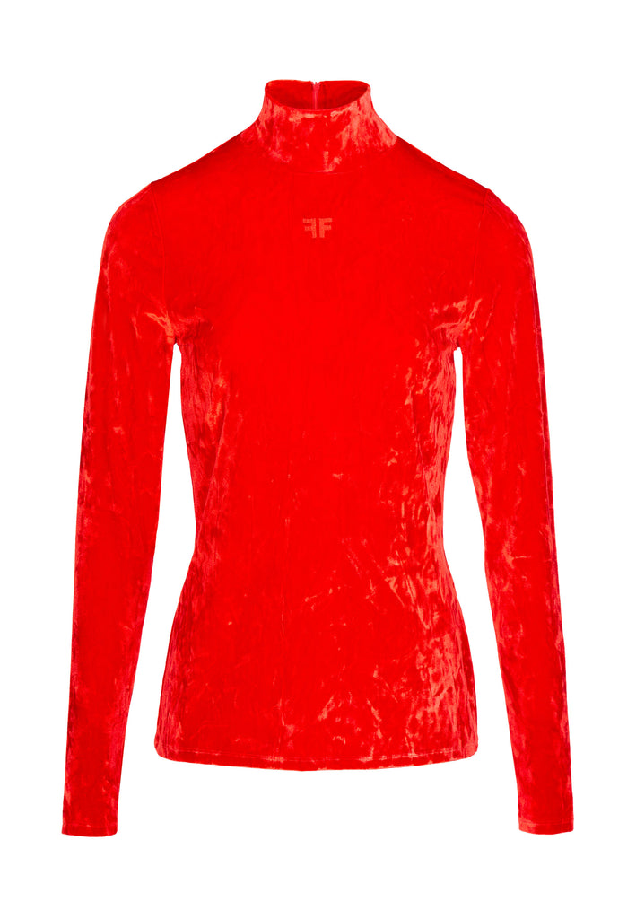 Fire red velvet top. Stretch velvet collar in vibrant red. Cut from lightweight velvet, it has a slim fit with a high turtleneck and long sleeves. Look closely and you'll see the fabric has a slightly shimmery finish. www.frenkenfashion.com