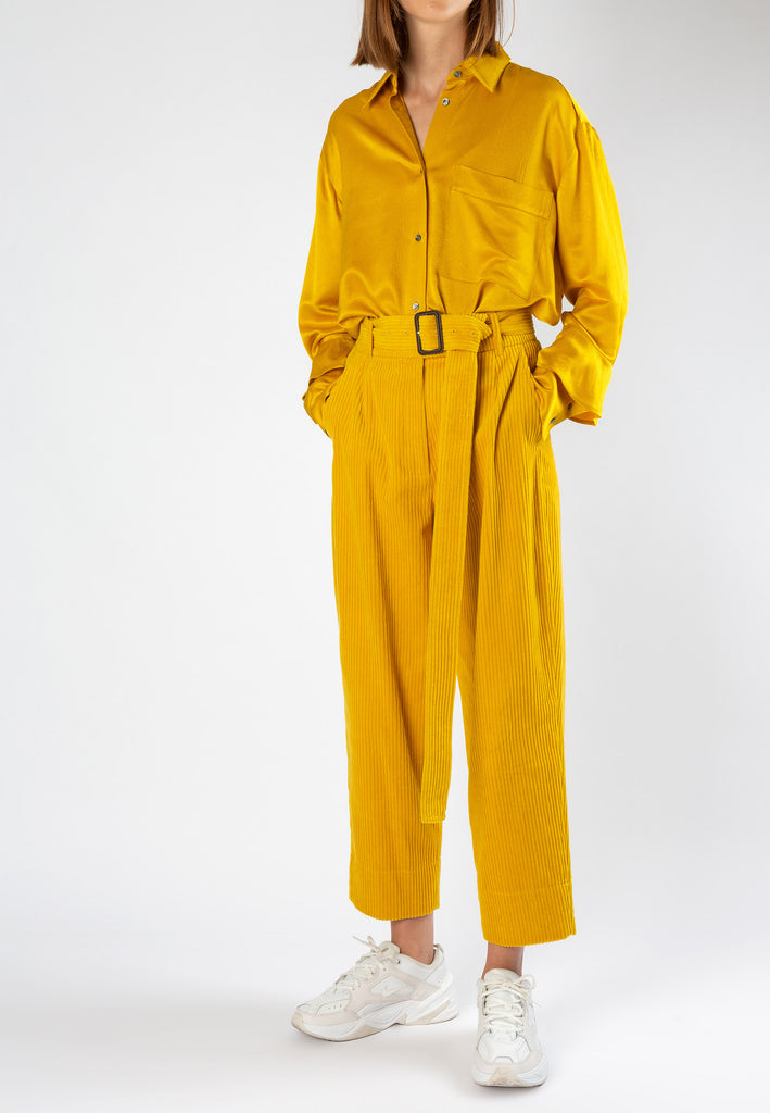 Corduroy | Pants | Mustard. Belted cotton corduroy pants. This pair sits high on the waist and falls to cropped, straight hems. With an adjustable belt. Al in a vibrant mustard yellow.