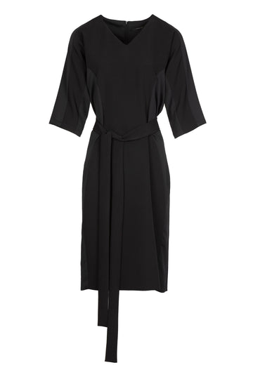 Saint | Dress | Black. 88% Polyester, 12% Elastane. Easy-wearing, relaxed fitted, midi dress, with a long belt and lateral satin panels for added detailing. Also available in orange.