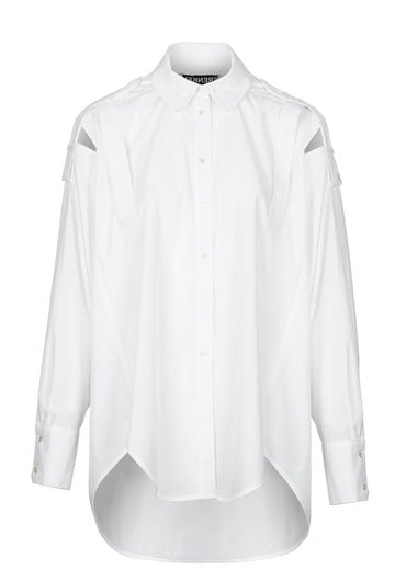 White shirt corps. Composition: 100% cotton. Oversize proportions of this version make it undoubtedly cool, too. frenkenfashion.com