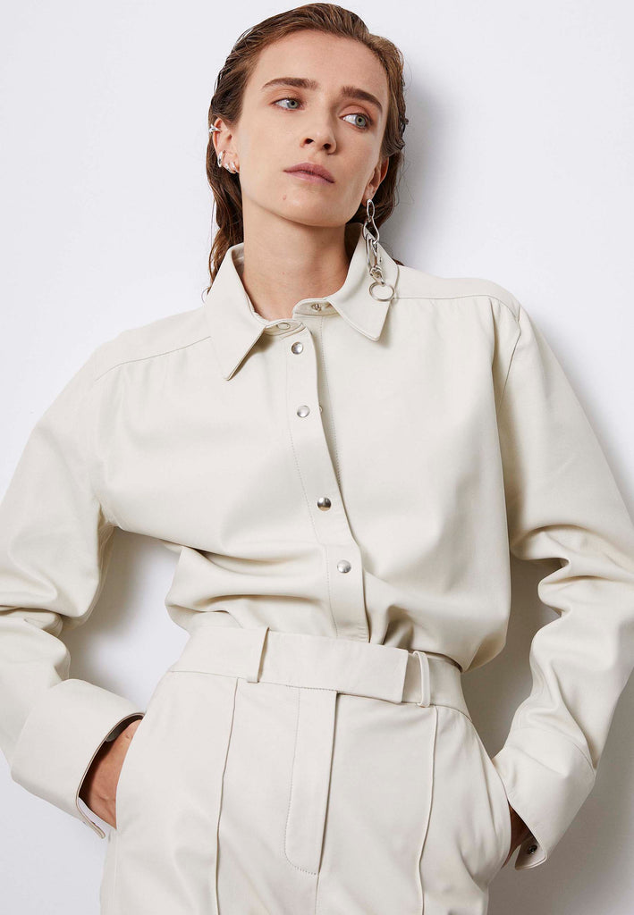 Nip shirt, off-white color. Men's inspired fitted shirt made from buttery leather in off-white and finished with metal press buttons. frenkenfashion.com