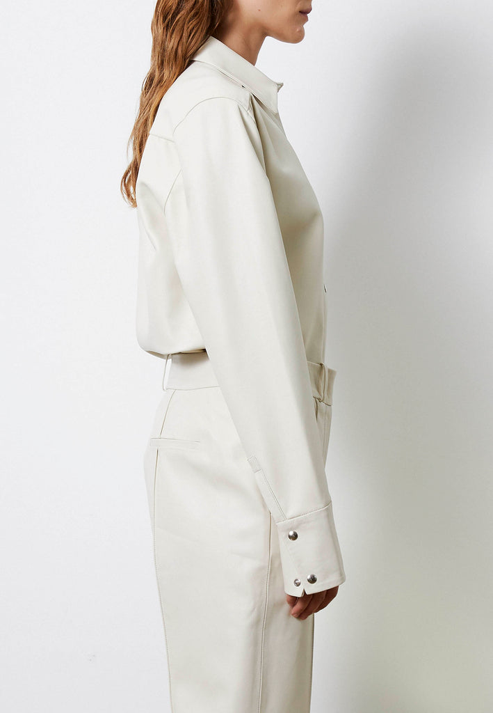 Nip shirt, off-white color. Men's inspired fitted shirt made from buttery leather in off-white and finished with metal press buttons. frenkenfashion.com