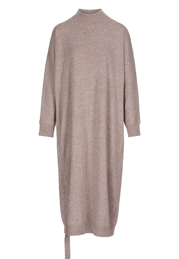 Soft maxi dress, knitted with smooth merino wool. Coming in camel shade, it is detailed with a shell-made strap placed on the side seam along the dress length which can be pulled out to create a crimp effect and asymmetric look. This will be your best friend during the cooler days, easy to style, simply layering it over tights or jeans. Also available in black.