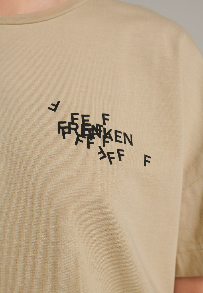 CUT jersey T-Shirt with cracked stamped logo beige. Cut for an oversized fit.