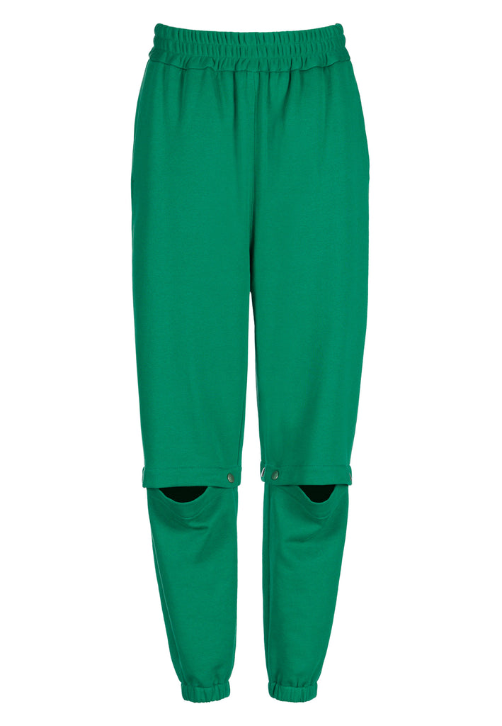 Relaxed fitted sweatpants in green. Cut from soft brushed terry. Detailed with metal press buttons turning the pipes into detachable. Relaxed high-rise silhouette with an elasticated waist and cuffs.