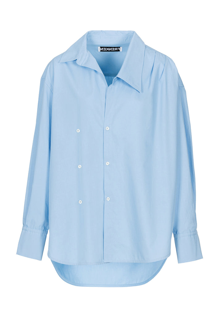 Menswear-inspired wrap-shirt in light blue. Features a second row of buttons, wear it normally or asymmetrically. 2 in 1. Fits oversize.