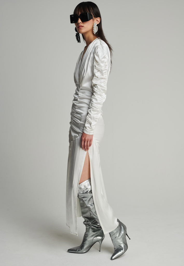 Satin midi dress in off-white. Features a v-neck, wrinkled-style hip and arms, and leg opening. True to size.