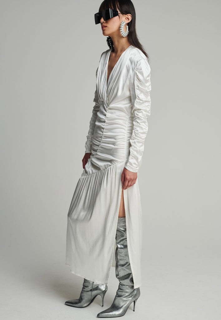Satin midi dress in off-white. Features a v-neck, wrinkled-style hip and arms, and leg opening. True to size.