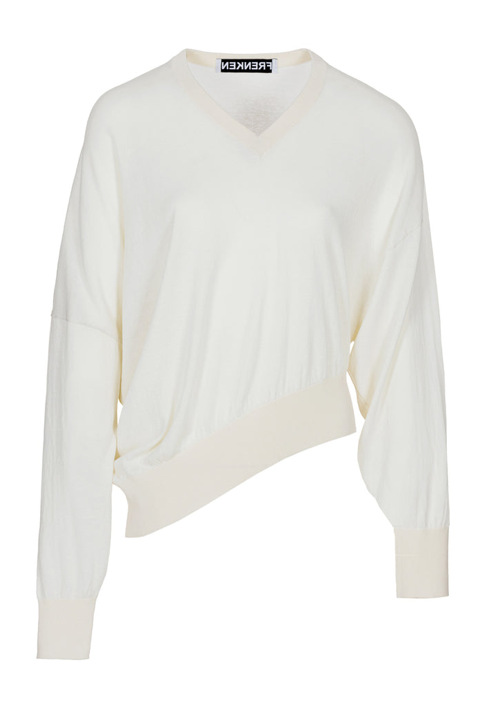 Cotton knitted loose jumper in off-white. Features a v-neck, an asymmetric effect, and wide cuffs. True to size.