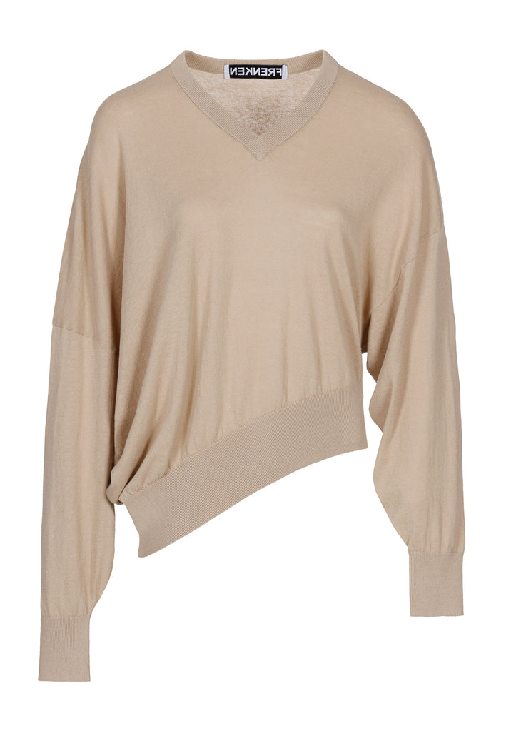 Cotton knitted loose jumper in camel. Features a v-neck, an asymmetric effect, and wide cuffs. True to size.