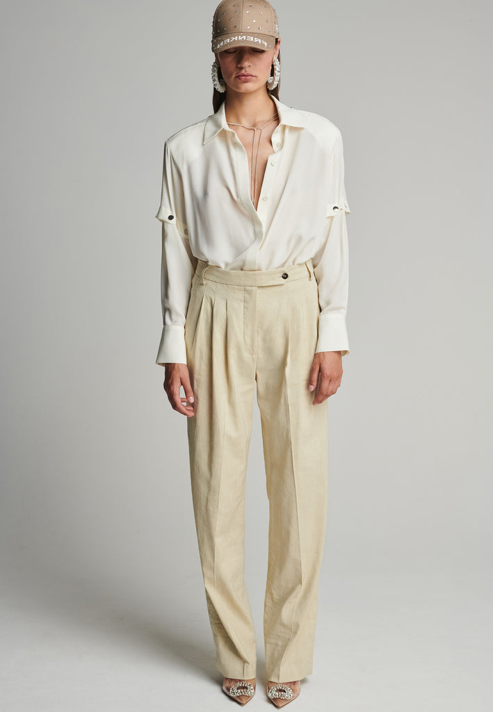 Wide-leg pants in stone. Features pockets, belt loops, and pressed front pleats. True to size.
