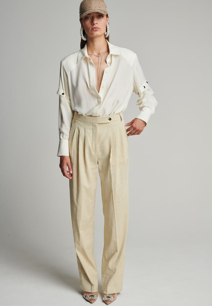Wide-leg pants in stone. Features pockets, belt loops, and pressed front pleats. True to size.
