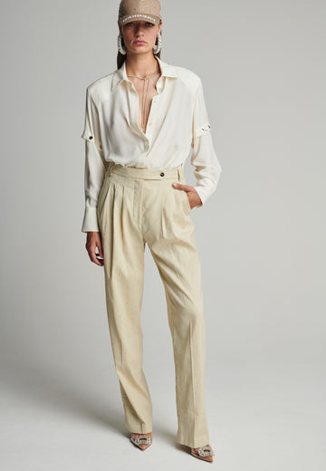 Wide-leg pants in stone. Features pockets, belt loops, and pressed front pleats. True to size.