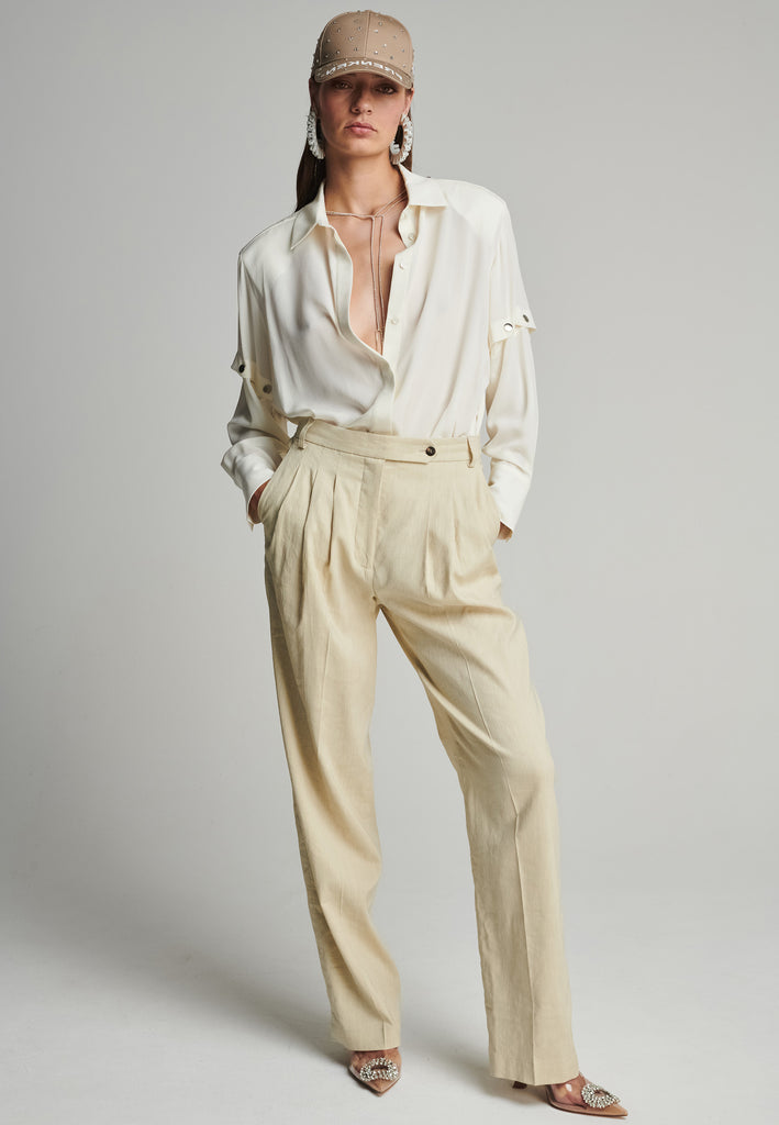 Wide-leg pants in stone. Features pockets, belt loops, and pressed front pleats. True to size.