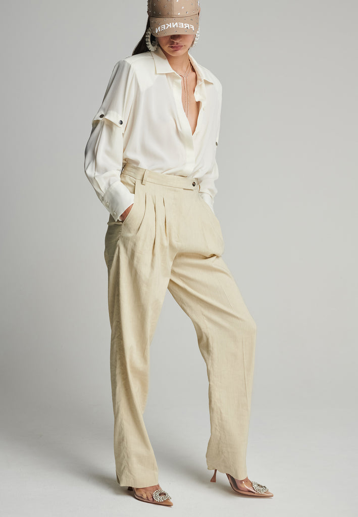 Wide-leg pants in stone. Features pockets, belt loops, and pressed front pleats. True to size.