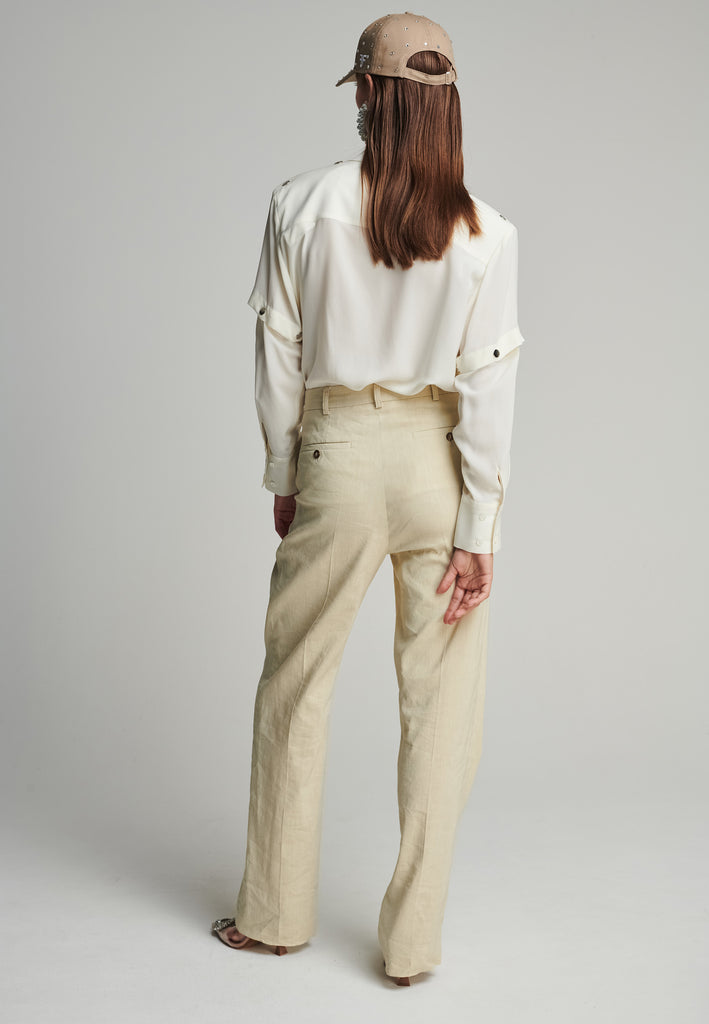 Wide-leg pants in stone. Features pockets, belt loops, and pressed front pleats. True to size.