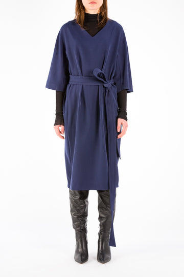Dress | Navy. Women clothing. A cool easy wearing relaxed fit LND (little navy dress). With a long stitched belt. You can wrap it twice  around your waist or wrap it one time. Two zips between the side panel. Model wears a size 36.