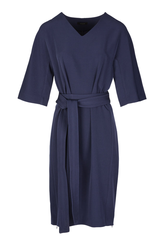 Blank | Dress | Navy. A cool easy wearing relaxed fit LND (little navy dress). With a long dubble stitched belt. You can wrap it twice  around your waist or wrap it one time. Two zips between the side panel. Model wears a size 36.