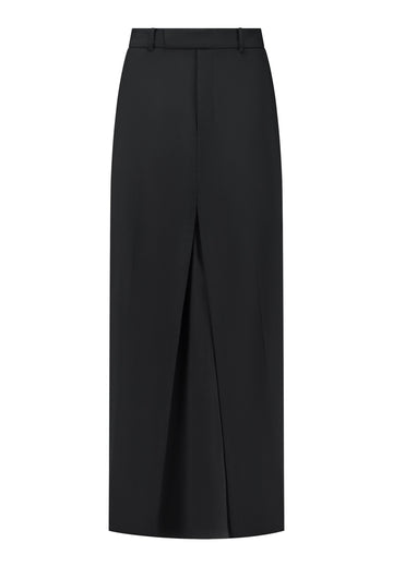 FOLLOW, a deconstructed chino turned into a double-layered skirt. Featuring prominent front and back slits which create effortless movement within every step. The side slits reveal the smooth silk georgette layer underneath making it the perfect day-to-night statement piece.